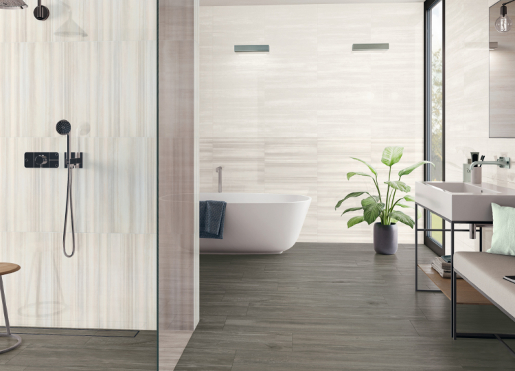 Badezimmer mit Dusche, Waschbecken und freistehender Badewanne, graue Holzoptik Fliesen und beiges Dekor an der Wand